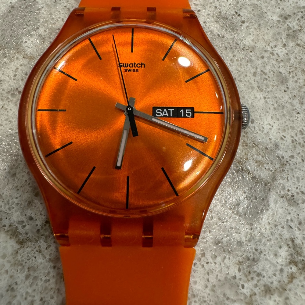 SWATCH watch - Bright Orange band with iridescent watch face;Day & Date settings